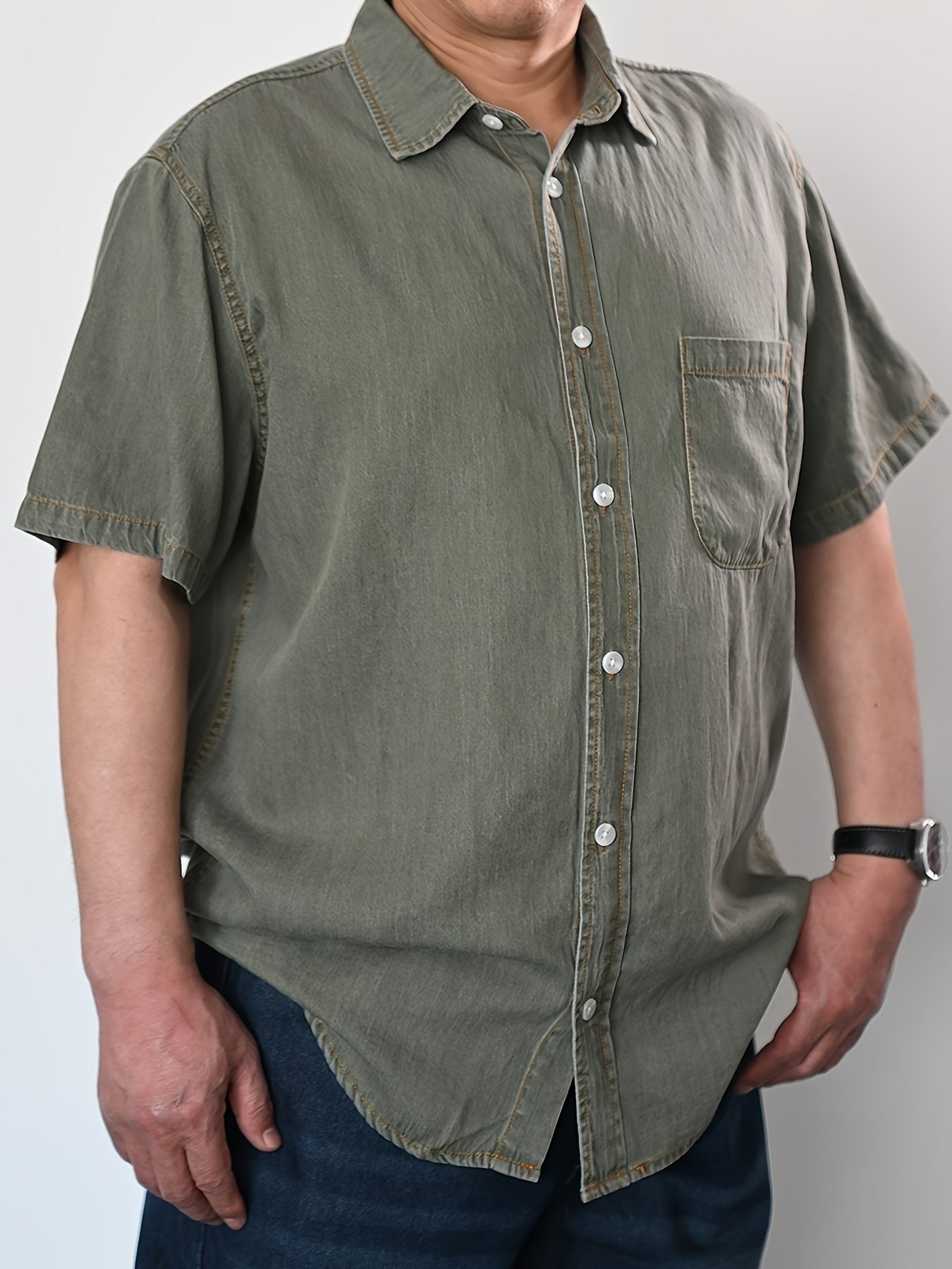 Summer-ready plus size men's denim shirt with vintage flair, V-neck, and button detail. Cotton and lyocell blend, machine washable. Plus size.