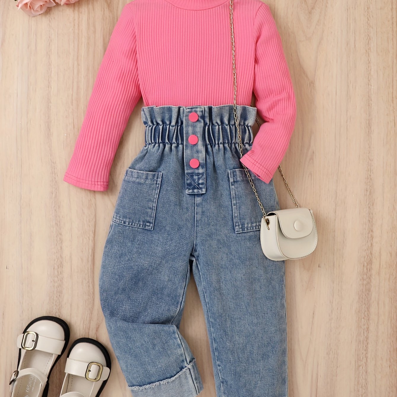 Girl's cotton denim pantsuit includes denim pants and a striped cotton long sleeve top.