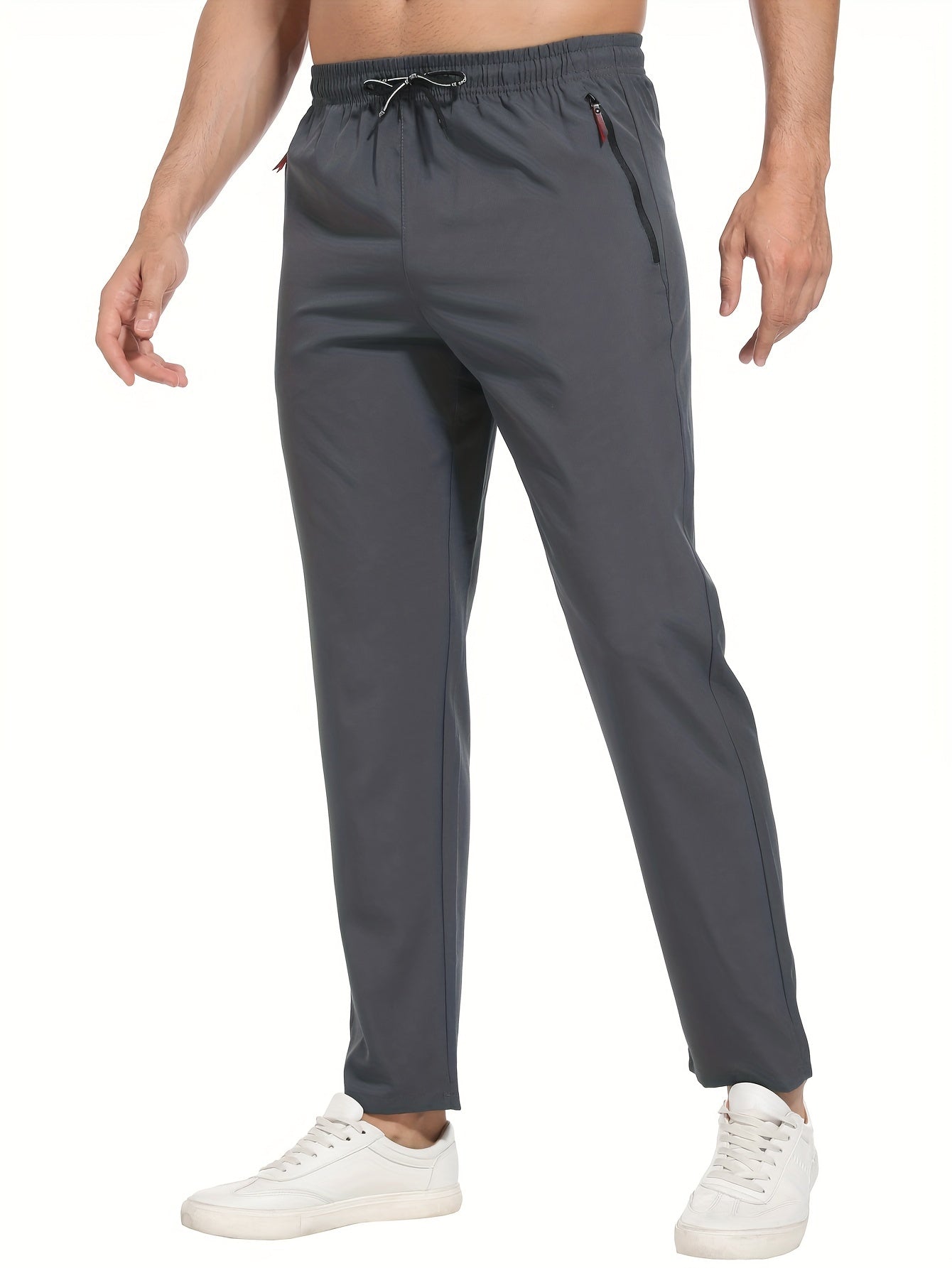 Breathable quick-dry joggers for men with drawstring, zipper pockets, stretchy, lightweight design for running, training, and outdoor activities by EIKELAND Oakspirit.