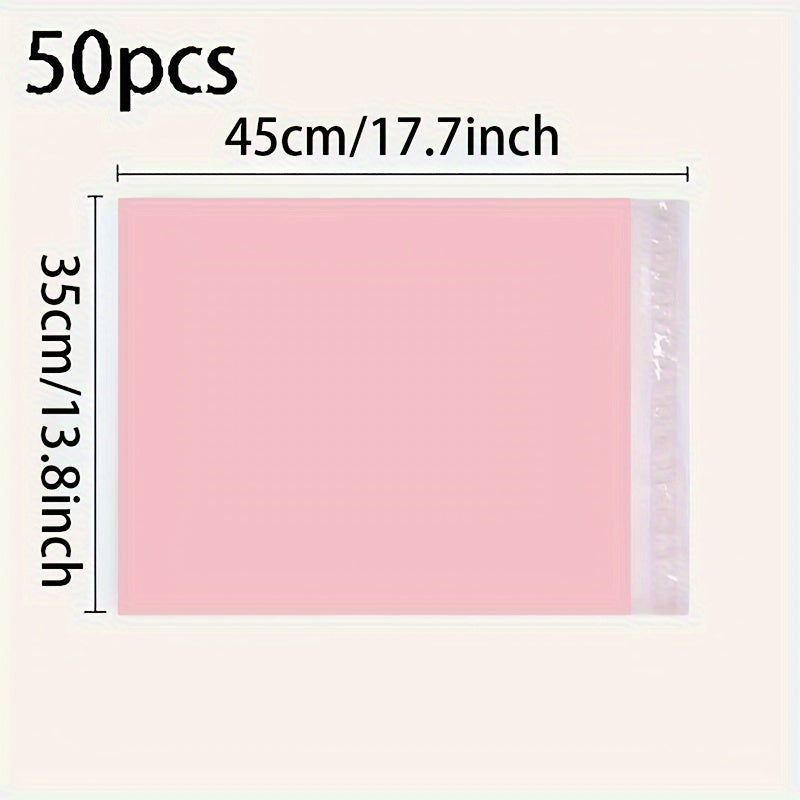 Bulk 50-pack of pink self-adhesive waterproof courier bags for shipping clothes, books, skate material. Durable plastic packaging.