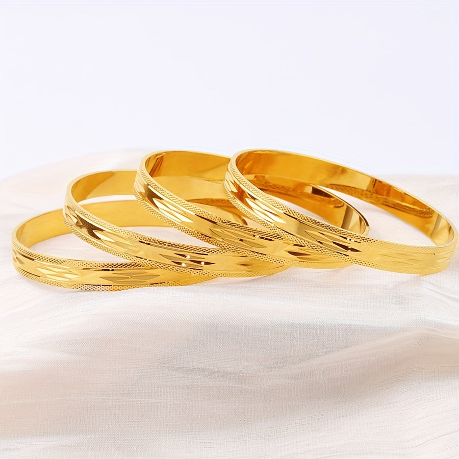 Set of 4 elegant and vintage-style bangles in a golden glossy finish for ladies. These fashion delicate bangles are perfect for both banquet events and daily wear, making them a perfect gift.