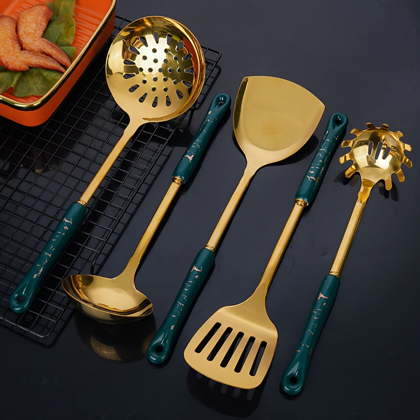 Set of seven pieces of stainless steel kitchenware, consisting of essential kitchen supplies.