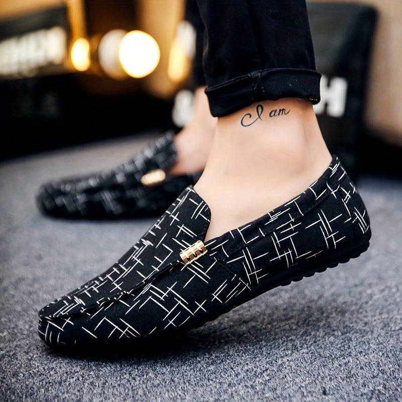 Men's slip-on loafers with stylish black and white geometric pattern, breathable mesh upper, rubber sole, and round toe. Perfect for outdoor wear in all seasons. Durable and comfortable