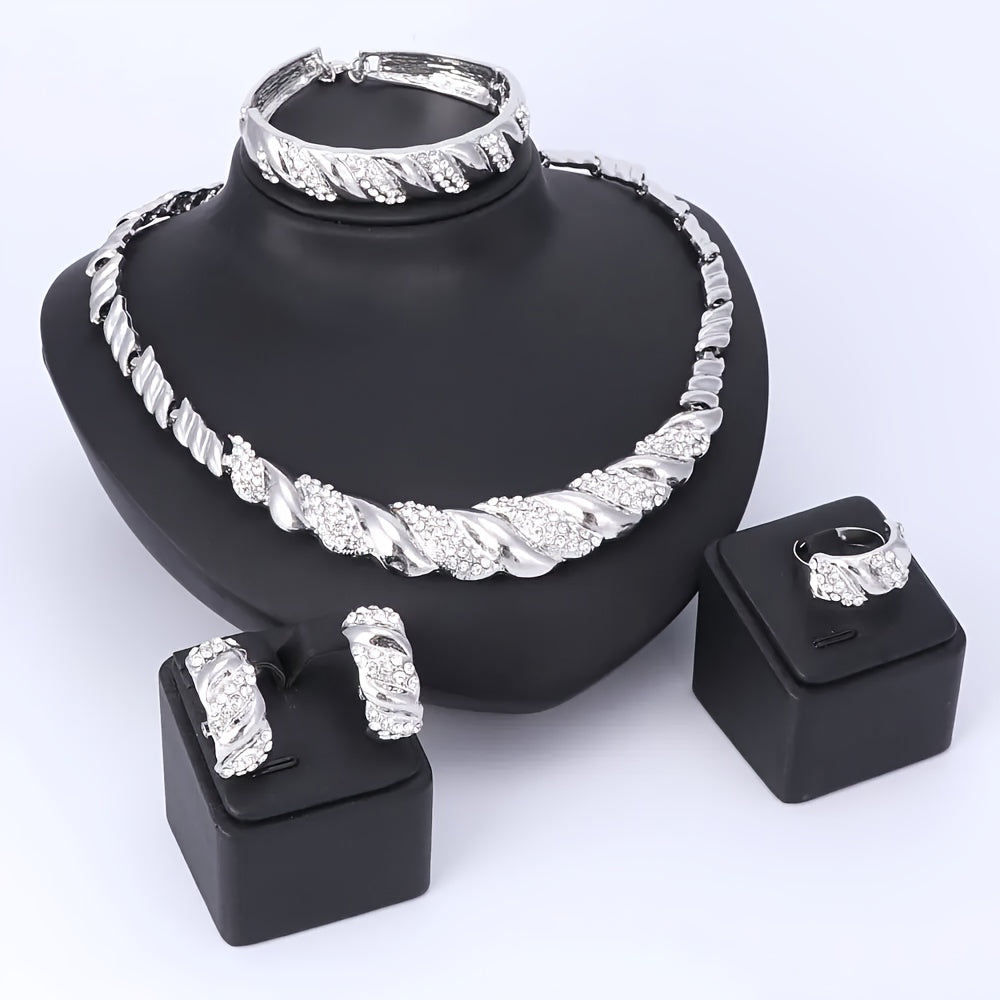 A stunning jewelry set, featuring a Middle Eastern-inspired design with gold-plated artificial crystals. This set includes a necklace, bracelet, earrings, and ring, perfect for women to wear at wedding parties or give as gifts.