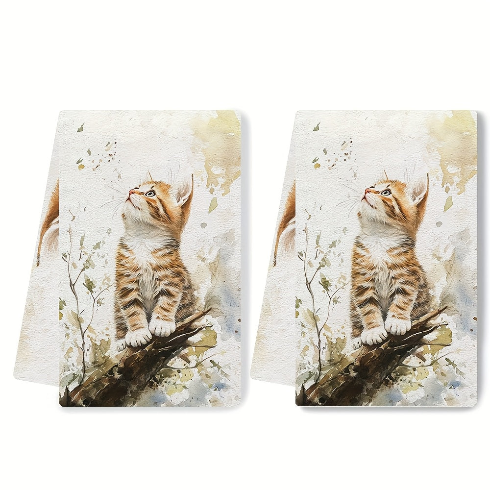 Set of 2 Ultra Soft Kitchen Towels featuring an Endearing Orange Kitten Design. These towels are highly absorbent and quick-drying, perfect for use in the kitchen. They are machine washable and ideal for cooking and baking. Each towel measures