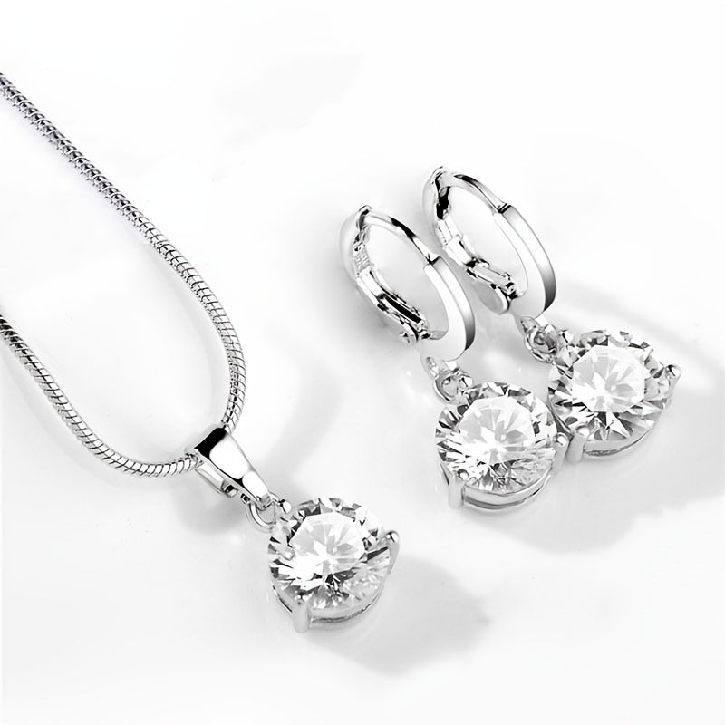 Crystal Zirconia pendant necklace & earrings set in white alloy with rhinestone accents, ideal for weddings and engagements, round shape, suitable for girls.