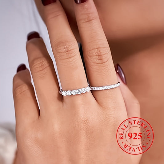 High quality gift for a special person, this 925 Sterling Silver Eternity Ring features a line of sparkling zirconia, perfect for engagement or wedding.