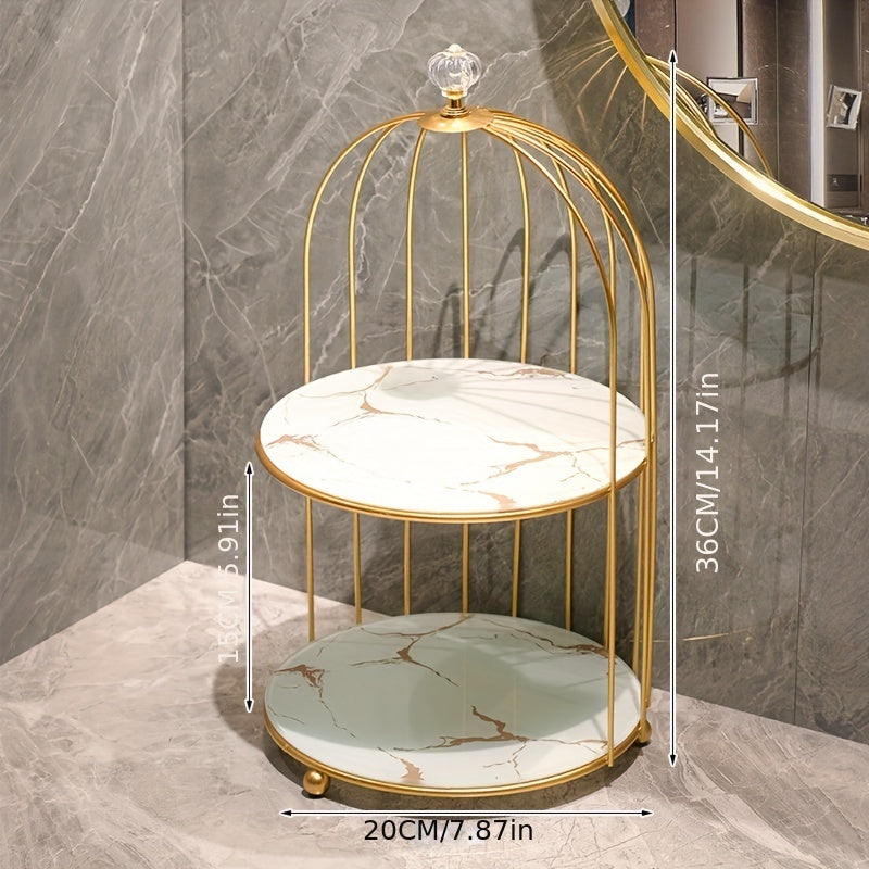 Elegant golden and white marble birdcage-inspired 2-tier makeup organizer with stainless steel rack and electrostatic spray finish. Portable and freestanding for bathroom and bedroom decor.