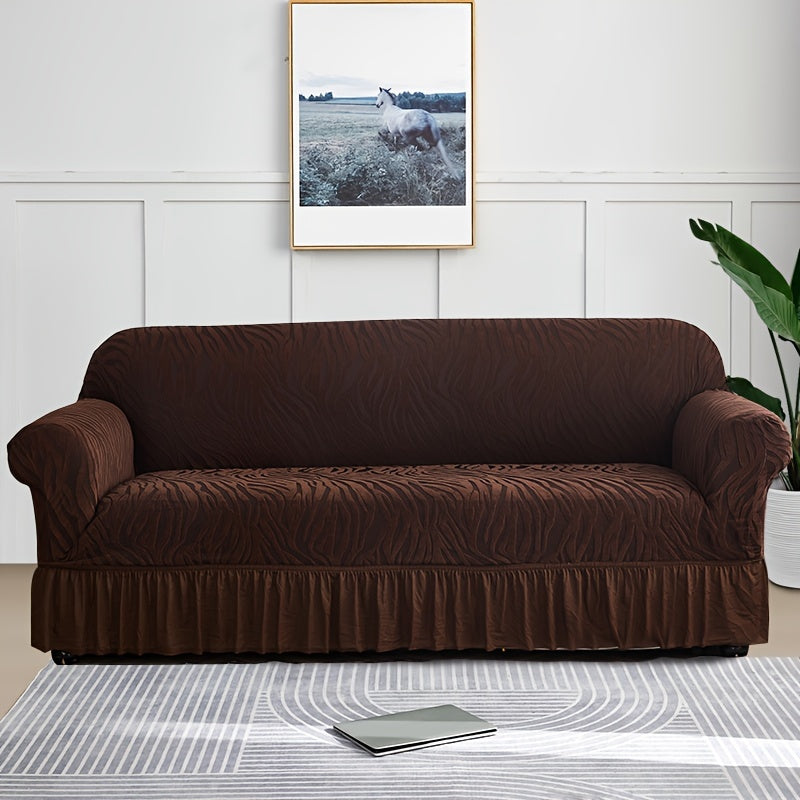 Wave pattern sofa slipcover with skirt, non-slip and dustproof. Protects furniture from cat scratches. Machine washable for easy cleaning. Suitable for bedroom, office, or living room décor.