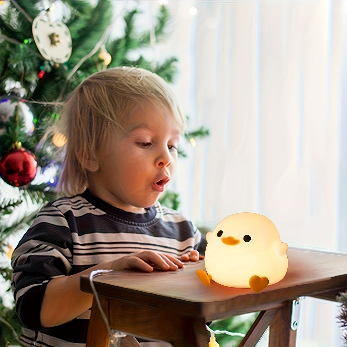 Duck-shaped silicone night light and pat lamp: Soft, eye-safe USB rechargeable bedside light for cozy room decor.