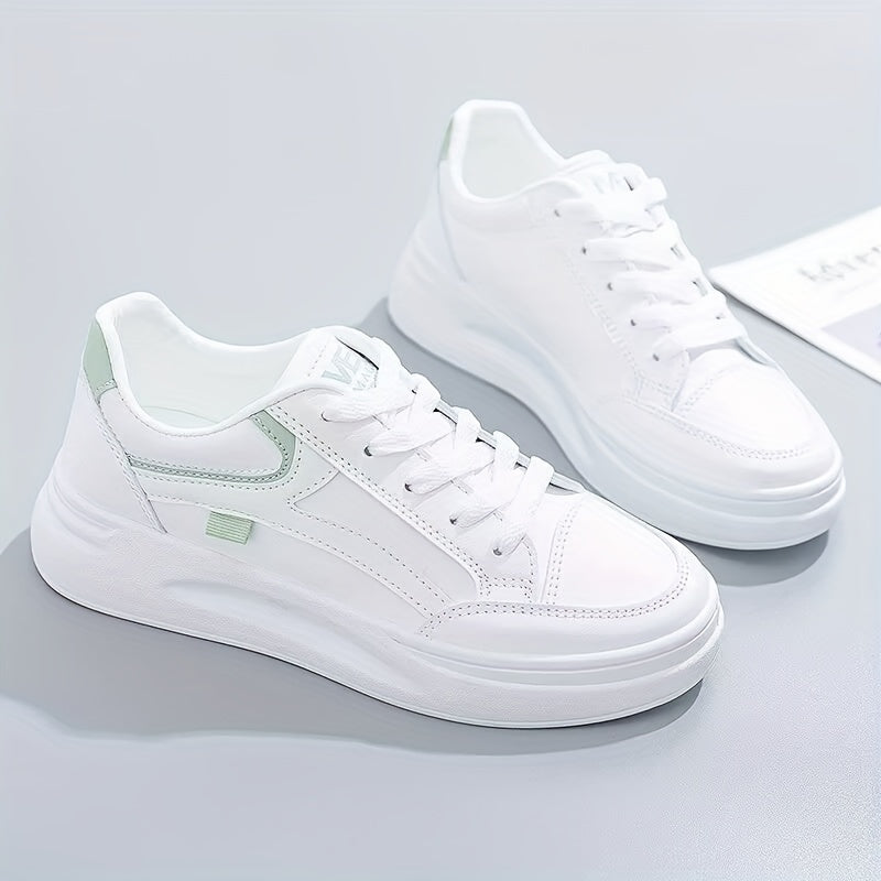 Stylish white sneakers with green accents for casual wear, lightweight and breathable.