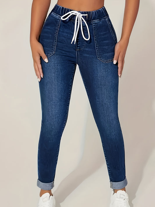 Plus size denim jeans for women with elastic drawstring waist and comfortable stretch fit.