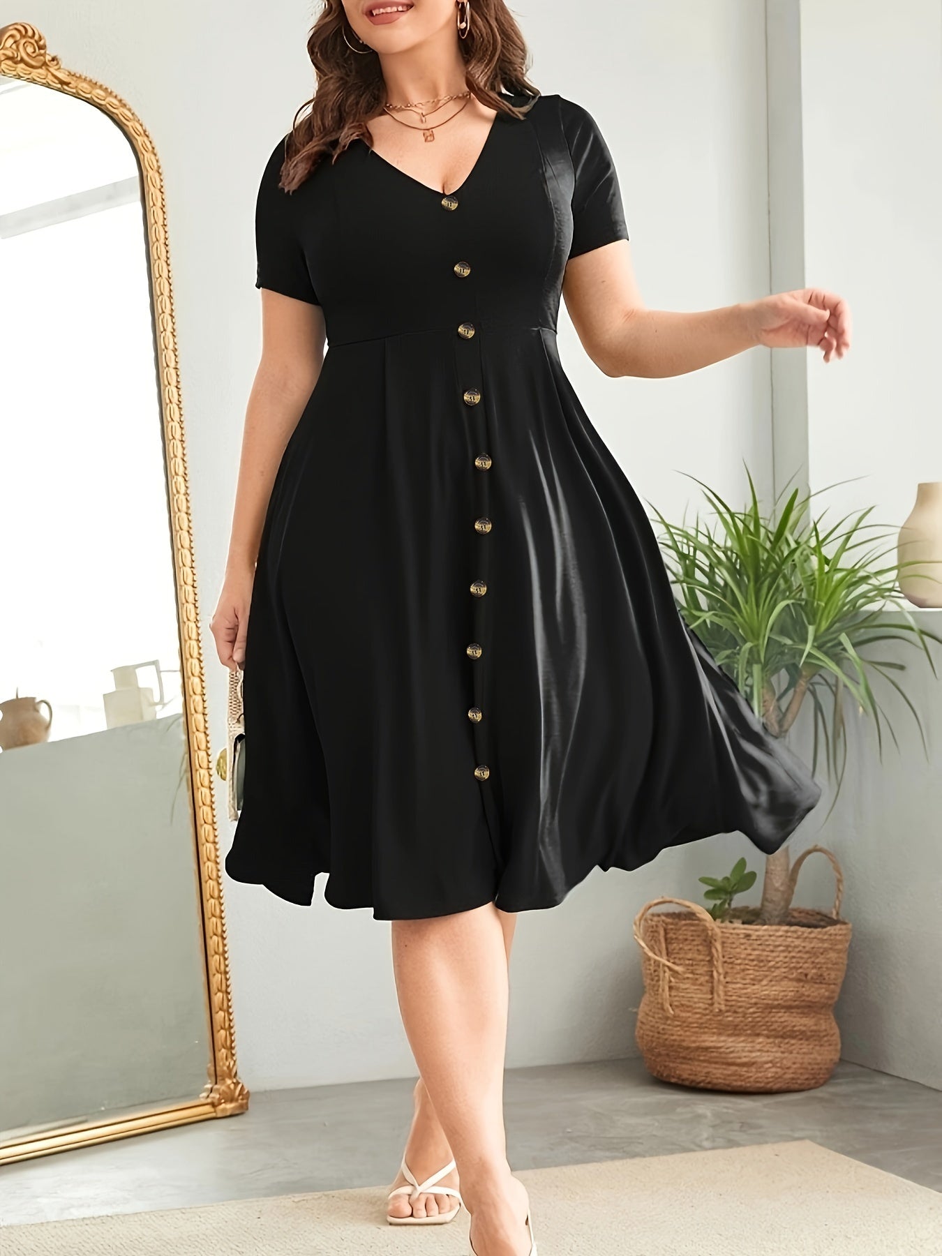 Button front cinched waist dress for plus size women, perfect for spring and summer.