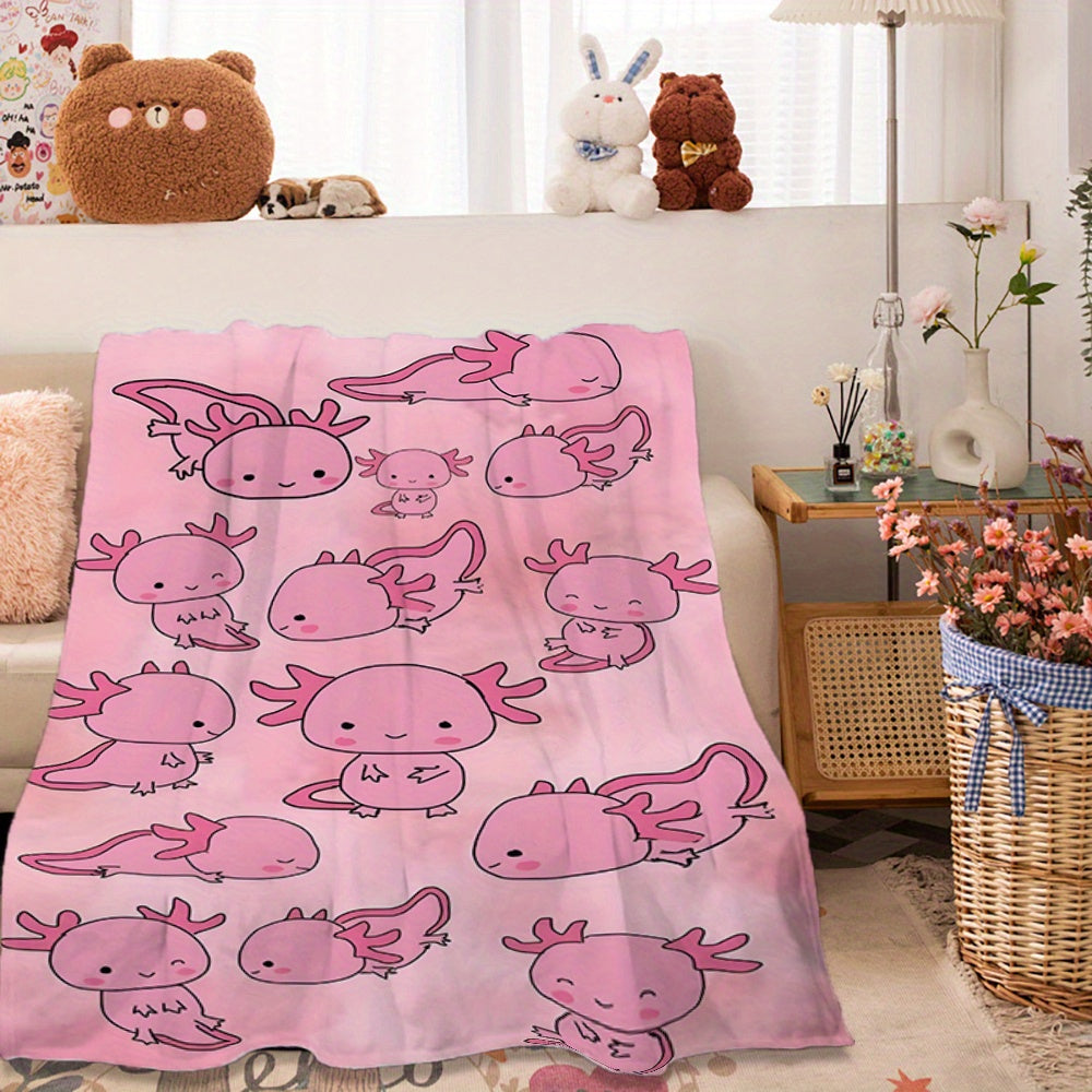 Soft, warm, and lightweight pink cartoon salamander print fleece blanket made of comfortable polyester flannel. Ideal for travel and versatile for all seasons, this contemporary style blanket is the perfect gift for boys, girls, and adults. Machine