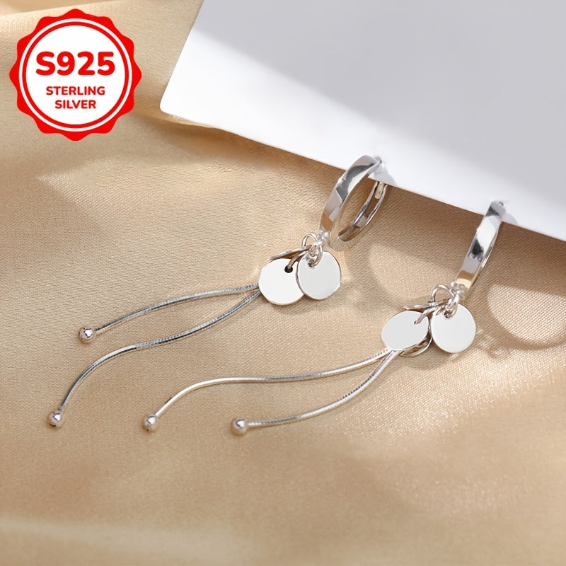 These chic earrings for women feature round tassel pendants made of 925 silver, weighing 3 grams. They exude a luxurious and versatile sense of fashion.