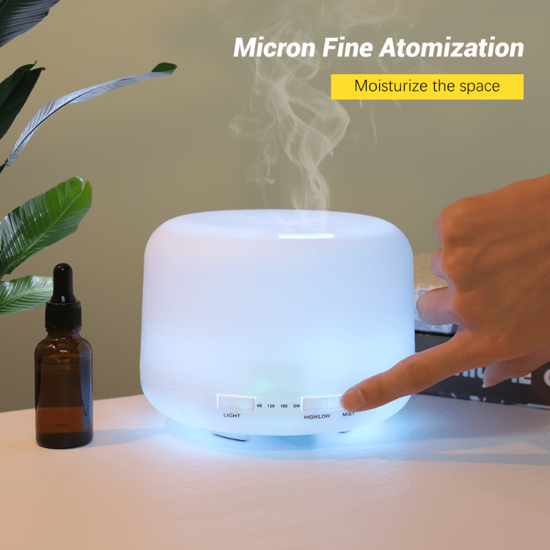 Aromatherapy humidifier with remote control and LED light, enhances mood and health with essential oils.