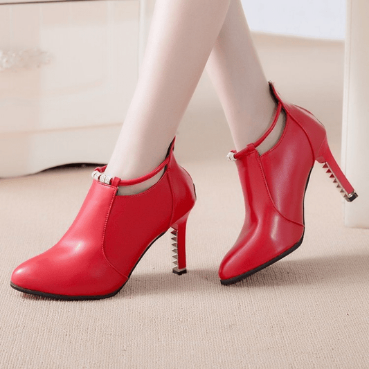 Stylish pointed toe stiletto boots with heel zipper for women.