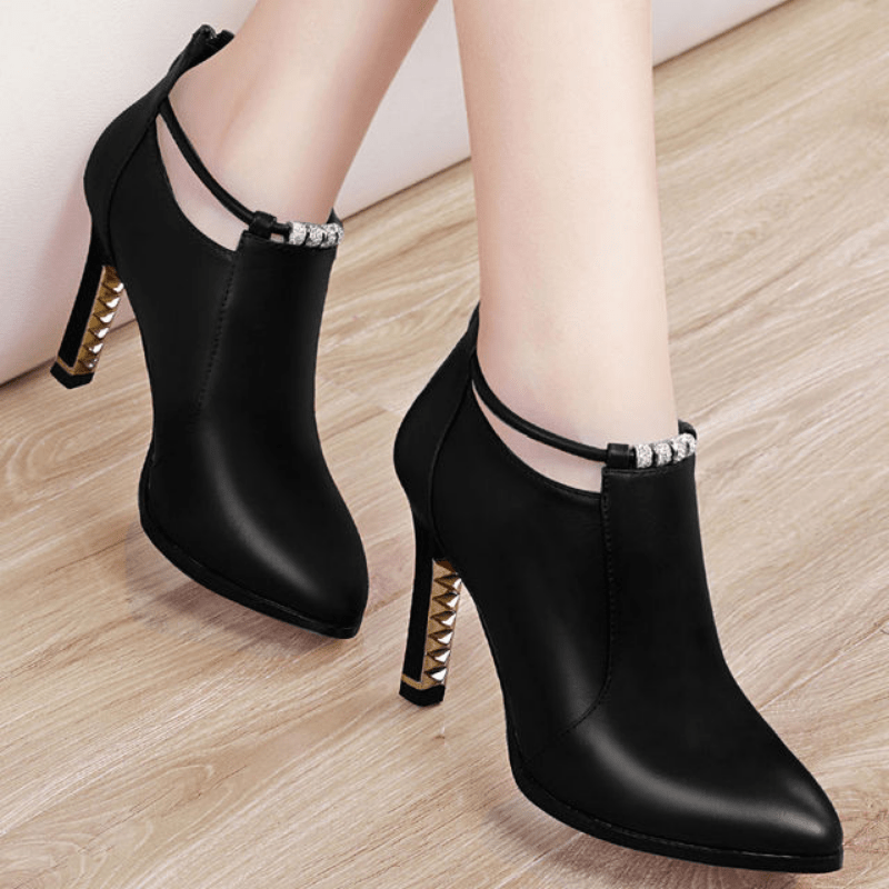 Stylish pointed toe stiletto boots with heel zipper for women.