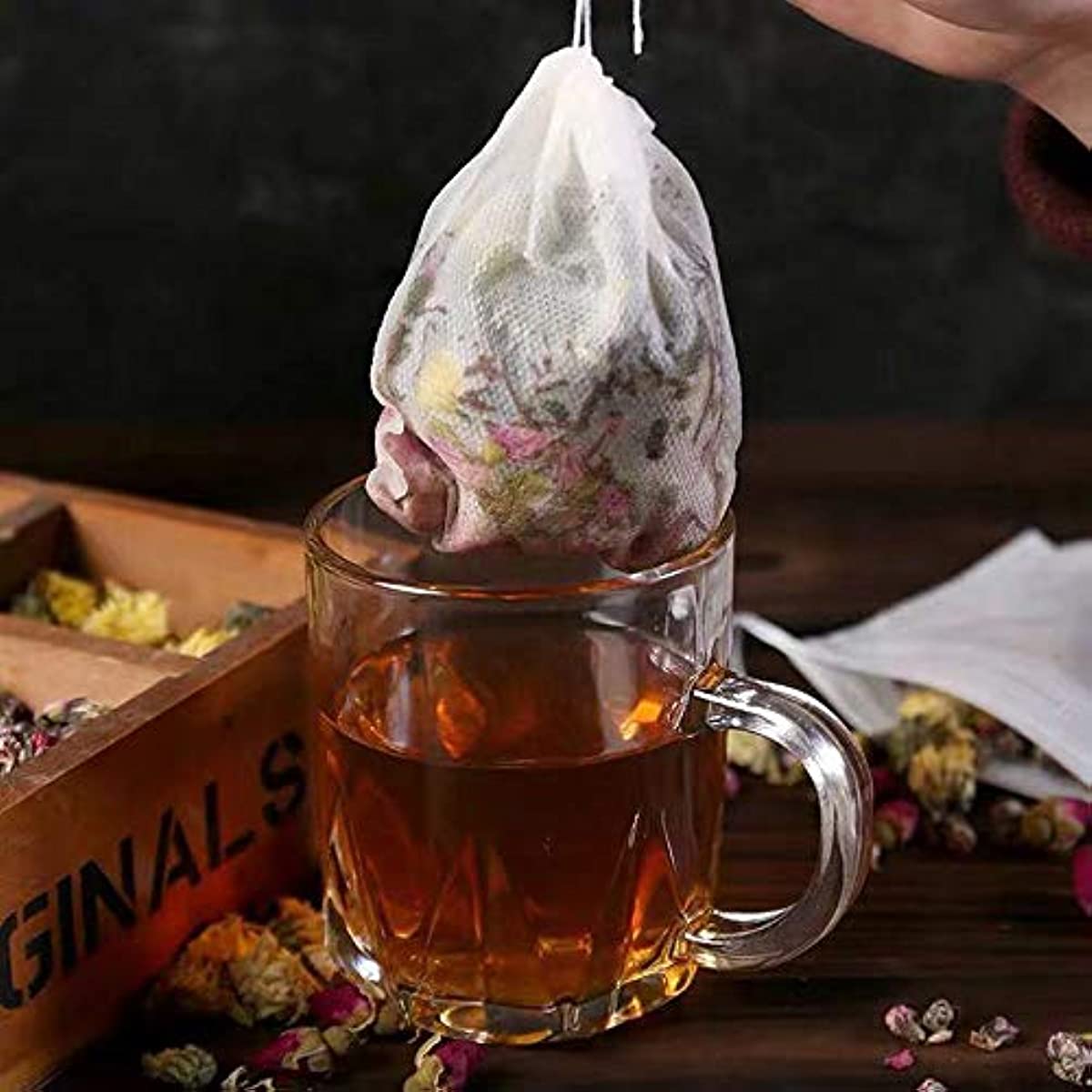 400 pieces of Tea Filter Bags, Disposable Empty Drawstring Seal Filter Loose Leaf Tea Bags measuring 8.99 X 6.99 cm.