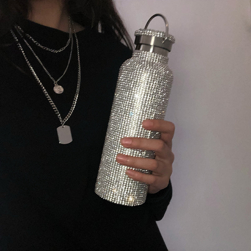 New 304 stainless steel water bottle in sizes of 350ml, 500ml, and 750ml, suitable for girls and adults to keep tea, coffee, or other beverages hot or cold.