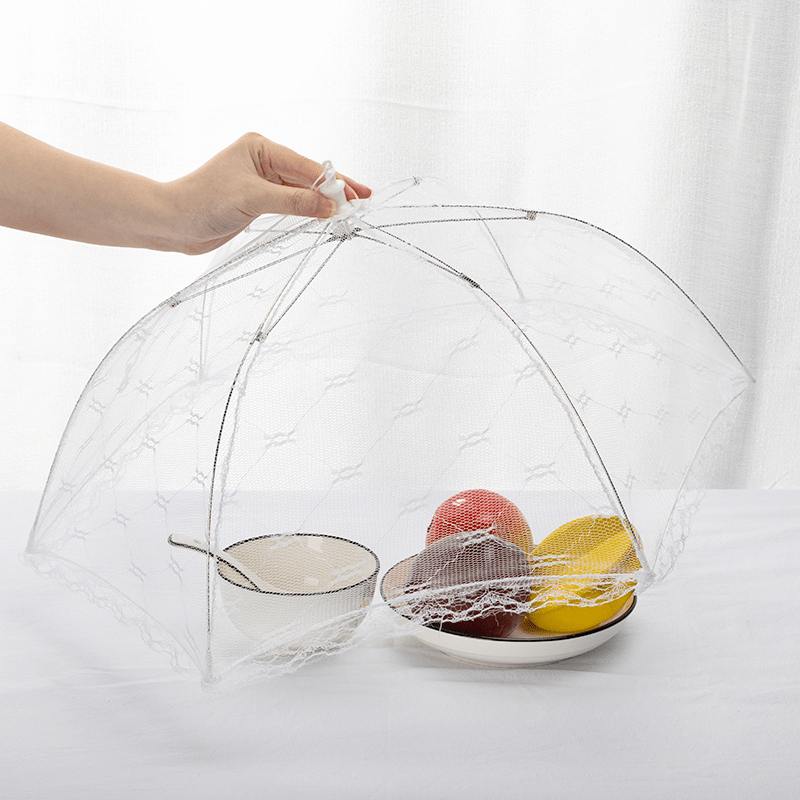 Portable food cover with macrame table for home use or camping.