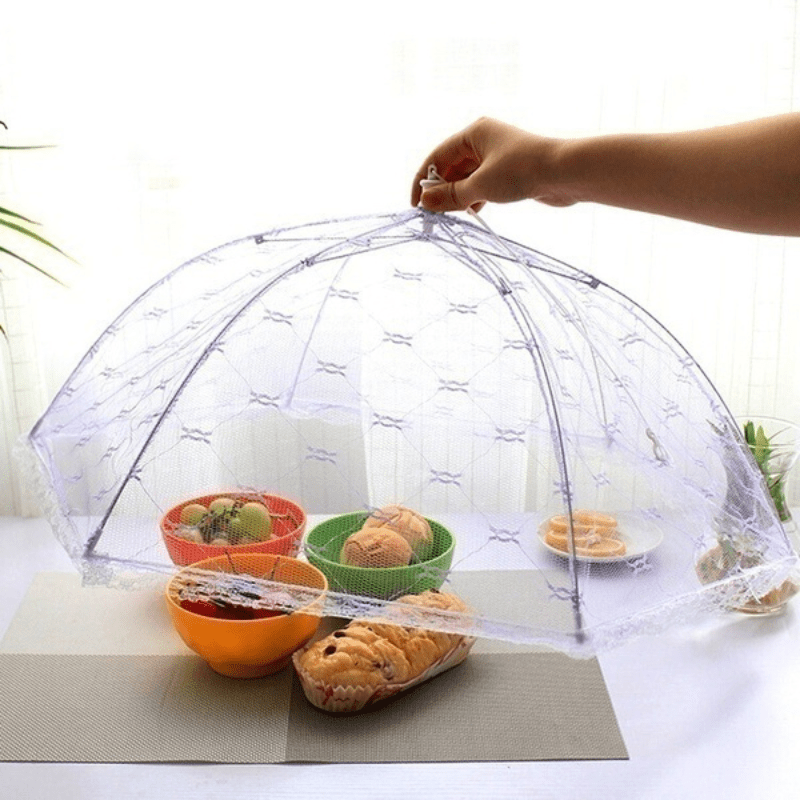 Portable food cover with macrame table for home use or camping.