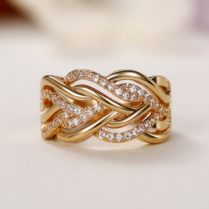 Interweaving micropaved zirconia golden wide ring luxury jewelry for women's wedding and engagement gifts.