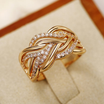 Interweaving micropaved zirconia golden wide ring luxury jewelry for women's wedding and engagement gifts.