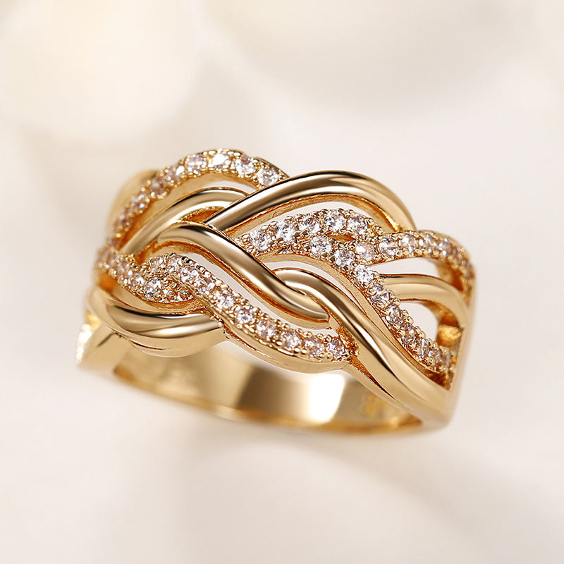 Interweaving micropaved zirconia golden wide ring luxury jewelry for women's wedding and engagement gifts.