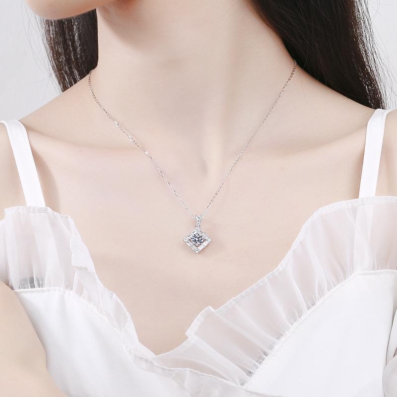 Experience luxury with the Tancise Silver Plated Jewelry Set featuring stunning Moissanite gems. This set includes S925 Sterling Silver 0.5ct stud earrings and a 1ct pendant necklace, both adorned with May birthstones. Perfect for weddings and banquets