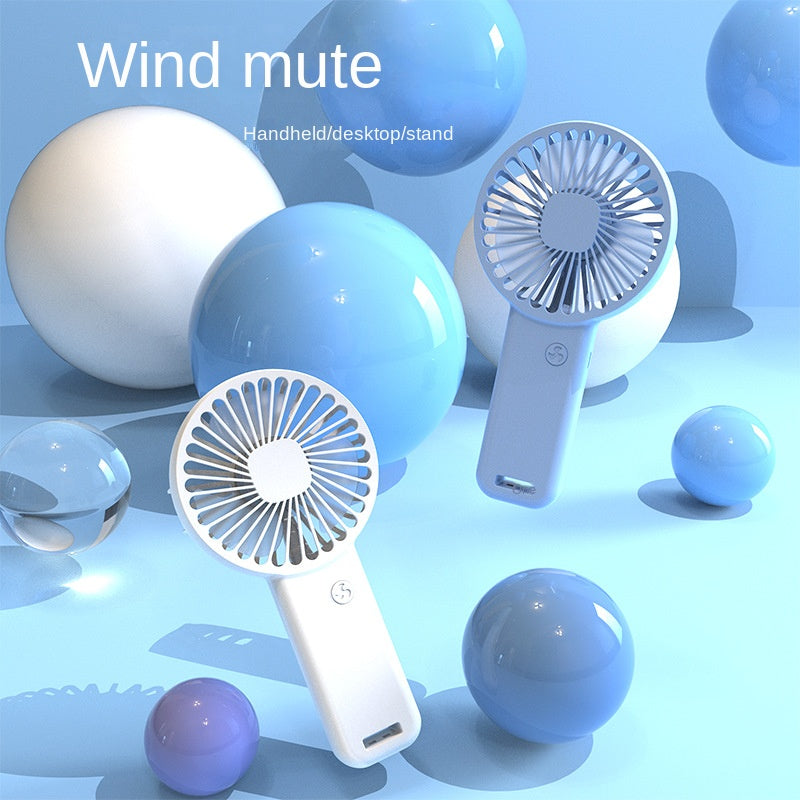 USB Rechargeable Handheld Fan - Portable Mini Fan Essential for Summer and Back to School, Perfect for RV, Camping, Picnics, and Travel. Mute operation makes it perfect for dorms, offices, and desktops. The ideal gift for anyone on the go.