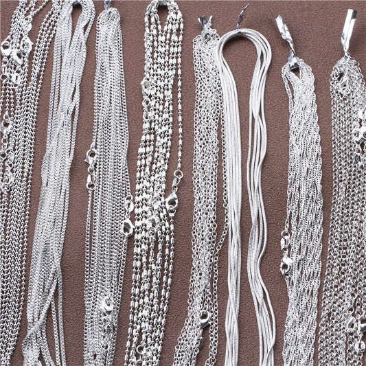 Silver plated link chain necklace with lobster clasp for jewelry making, available in 16-30 inch lengths and sold in a set of 5 pieces.