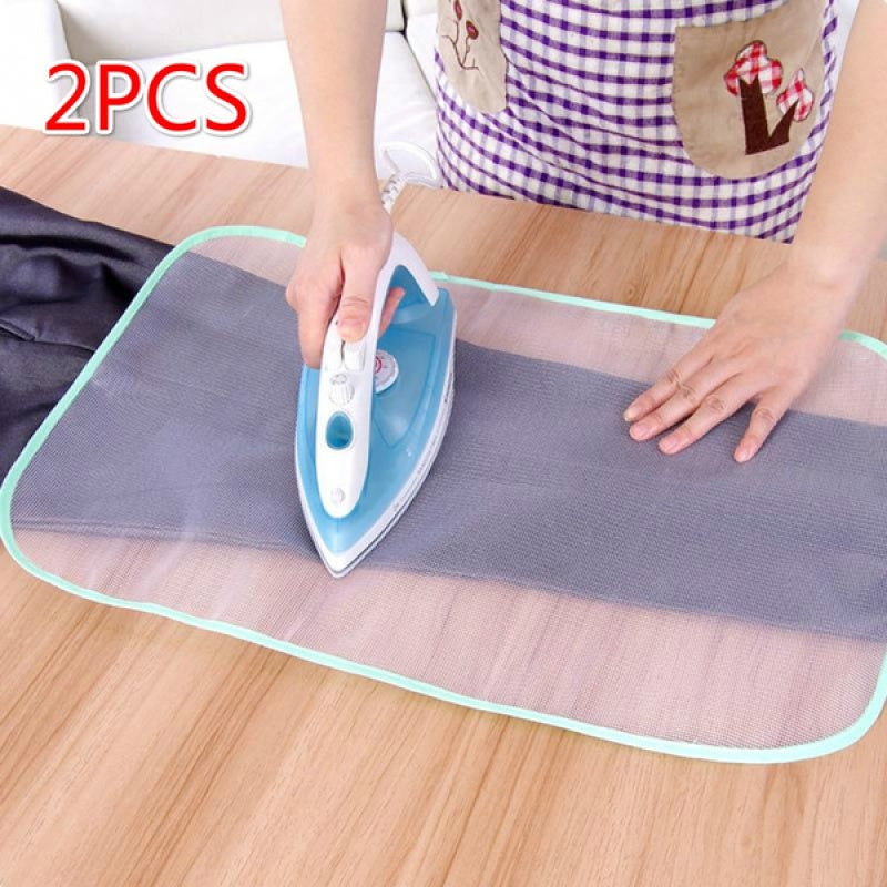 Iron worry-free with our 2-piece High Temperature Ironing Cloth set. These versatile cloths protect both your clothing and ironing board, while also providing an insulation pad for safe ironing. A must-have home accessory for any laundry room!