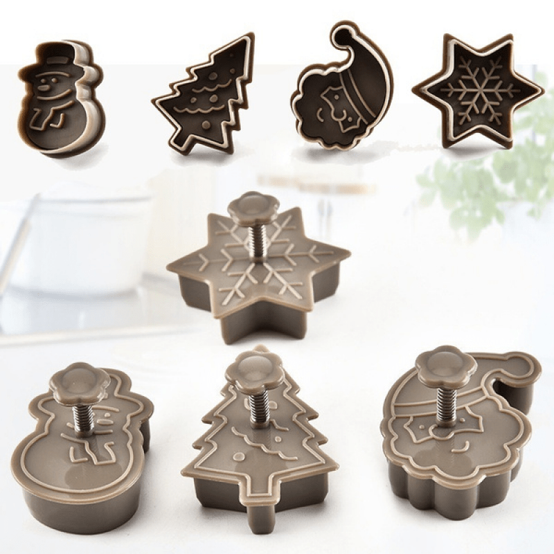 Christmas Cookie Cutter Set includes 4 pieces featuring Snowman, Snowflake, Christmas Tree, and Santa Claus patterns. Ideal for holiday baking.