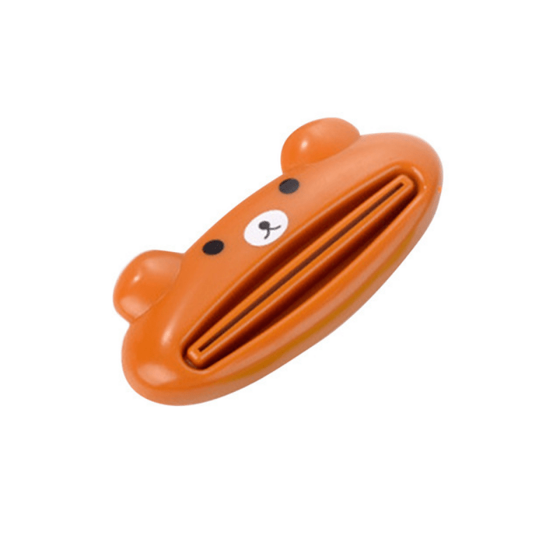 Toothpaste squeezer with animal design for bathroom use.