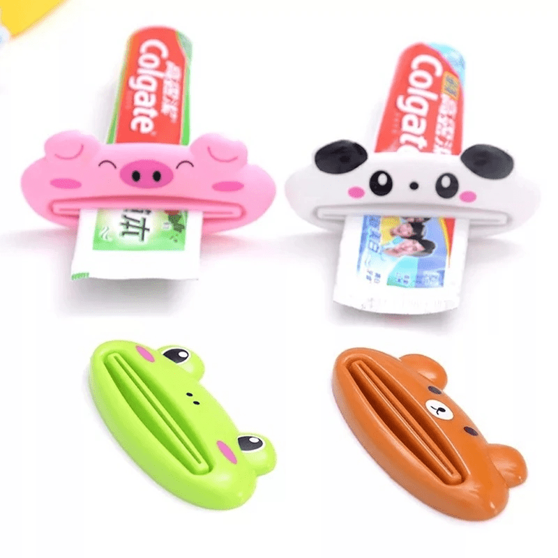 Toothpaste squeezer with animal design for bathroom use.