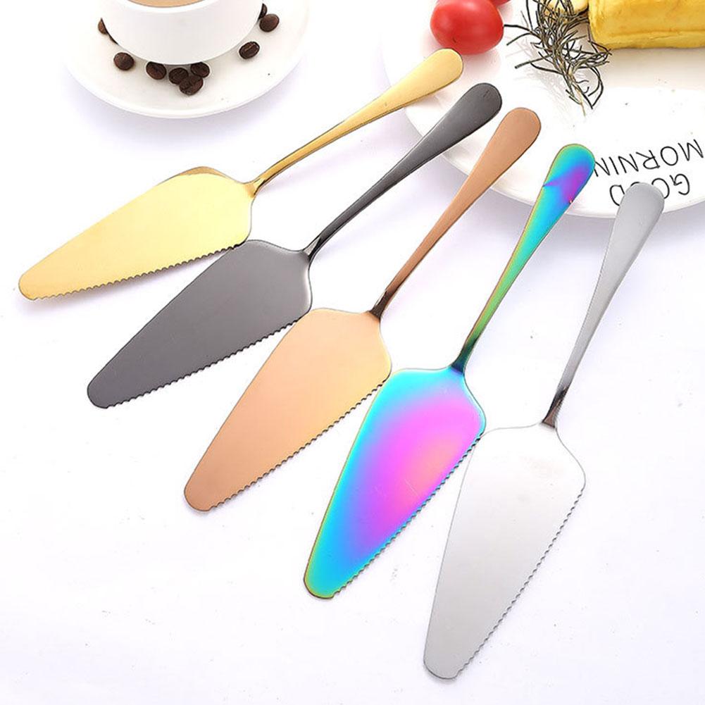 Cake cutting set including stainless steel spatula, knife, and pizza cutter for baking and pastry needs.