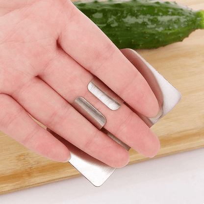 1pc Stainless Steel Finger Guard for slicing, reusable, and provides safety during cutting in the kitchen.