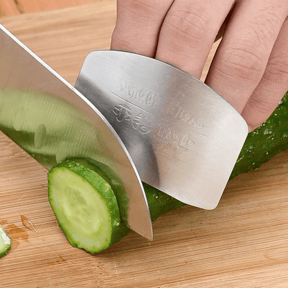 1pc Stainless Steel Finger Guard for slicing, reusable, and provides safety during cutting in the kitchen.