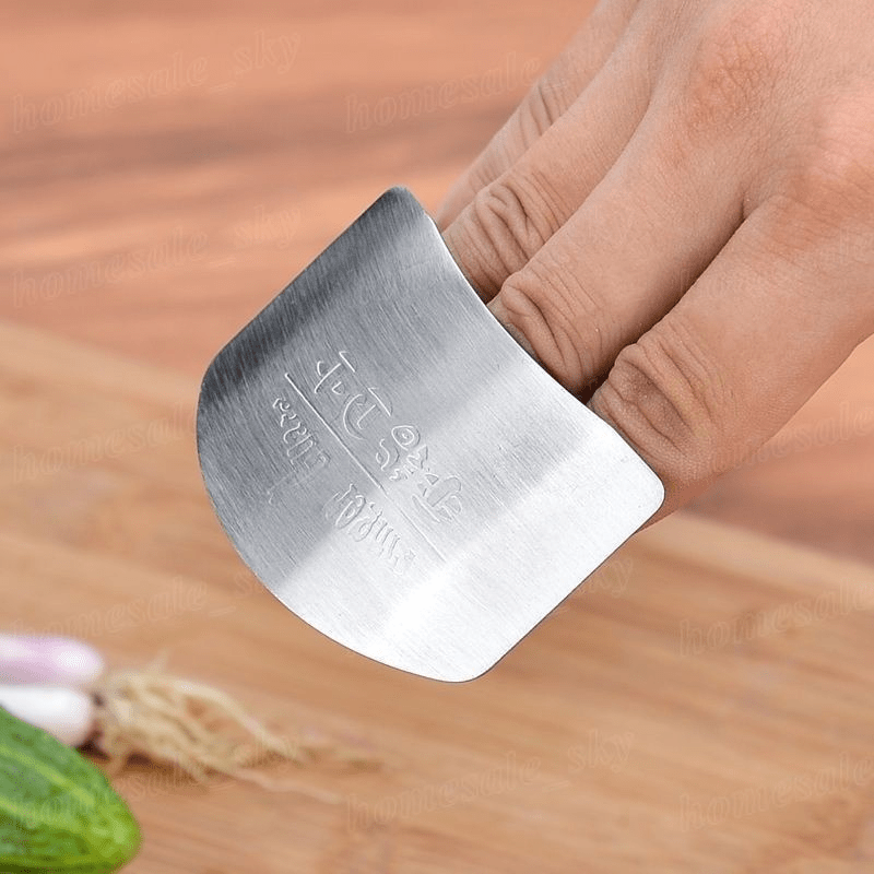 1pc Stainless Steel Finger Guard for slicing, reusable, and provides safety during cutting in the kitchen.