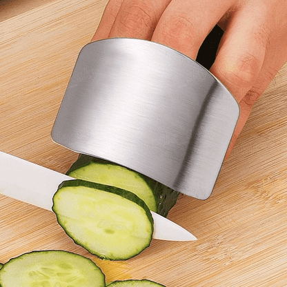 1pc Stainless Steel Finger Guard for slicing, reusable, and provides safety during cutting in the kitchen.