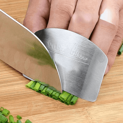 1pc Stainless Steel Finger Guard for slicing, reusable, and provides safety during cutting in the kitchen.