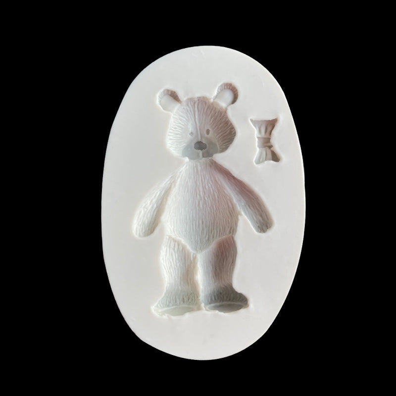 One-piece Cute Bear Chocolate Mold - This 3D Silicone Cartoon Candy Mold is perfect for DIY Cake Decorating and Baking. Featuring a Kawaii design with a Bowtie, this Fondant Mold is a must-have Kitchen Gadget and Home Kitchen Item.