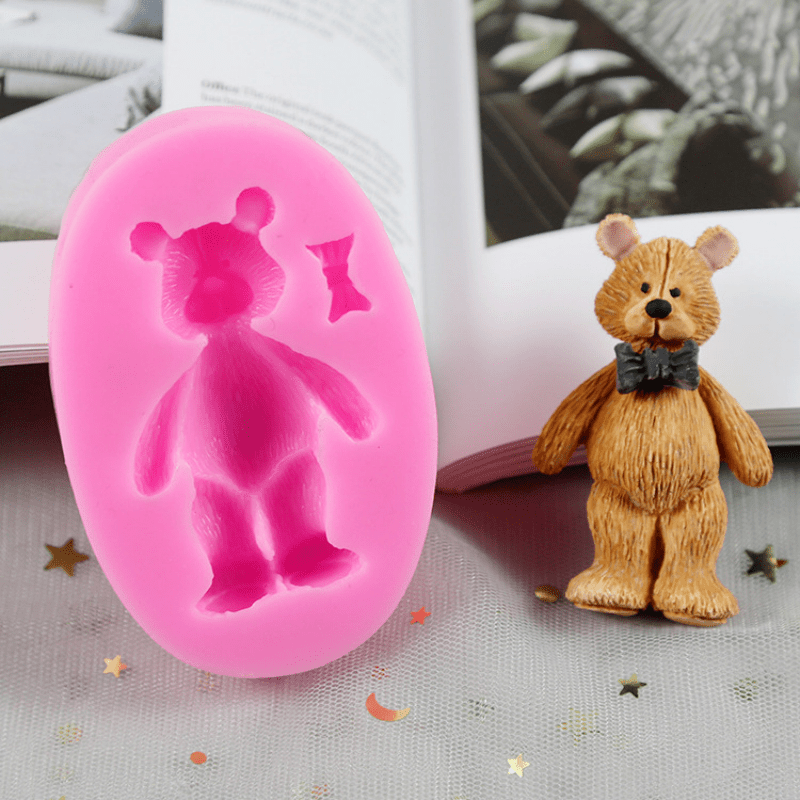 One-piece Cute Bear Chocolate Mold - This 3D Silicone Cartoon Candy Mold is perfect for DIY Cake Decorating and Baking. Featuring a Kawaii design with a Bowtie, this Fondant Mold is a must-have Kitchen Gadget and Home Kitchen Item.