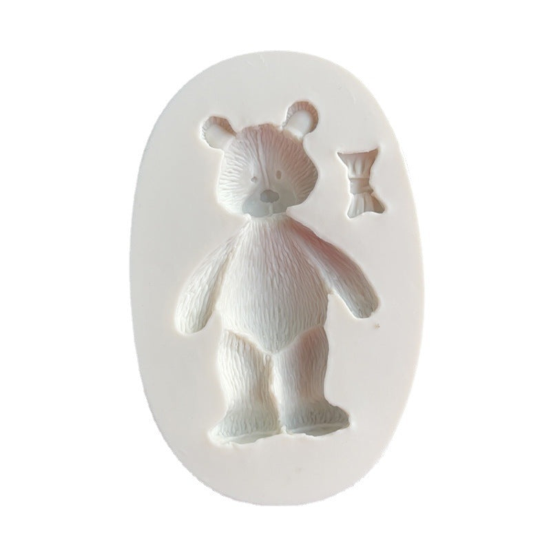 One-piece Cute Bear Chocolate Mold - This 3D Silicone Cartoon Candy Mold is perfect for DIY Cake Decorating and Baking. Featuring a Kawaii design with a Bowtie, this Fondant Mold is a must-have Kitchen Gadget and Home Kitchen Item.