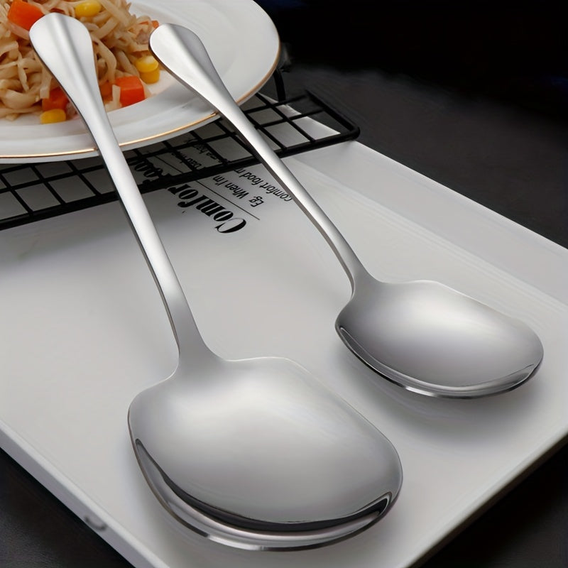 2 pieces of stainless steel serving spoons for catering events and parties.