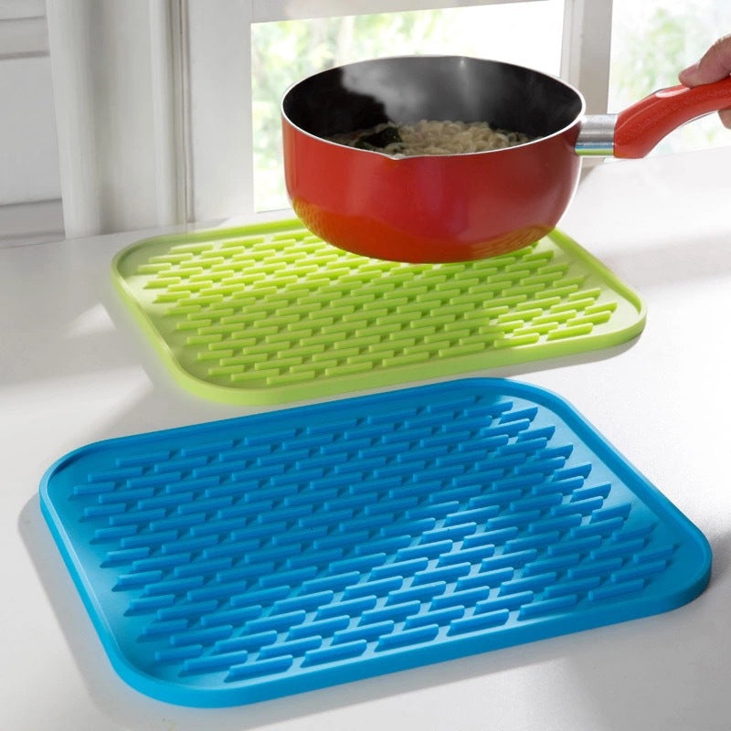 Versatile silicone heat-resistant mat for various uses.