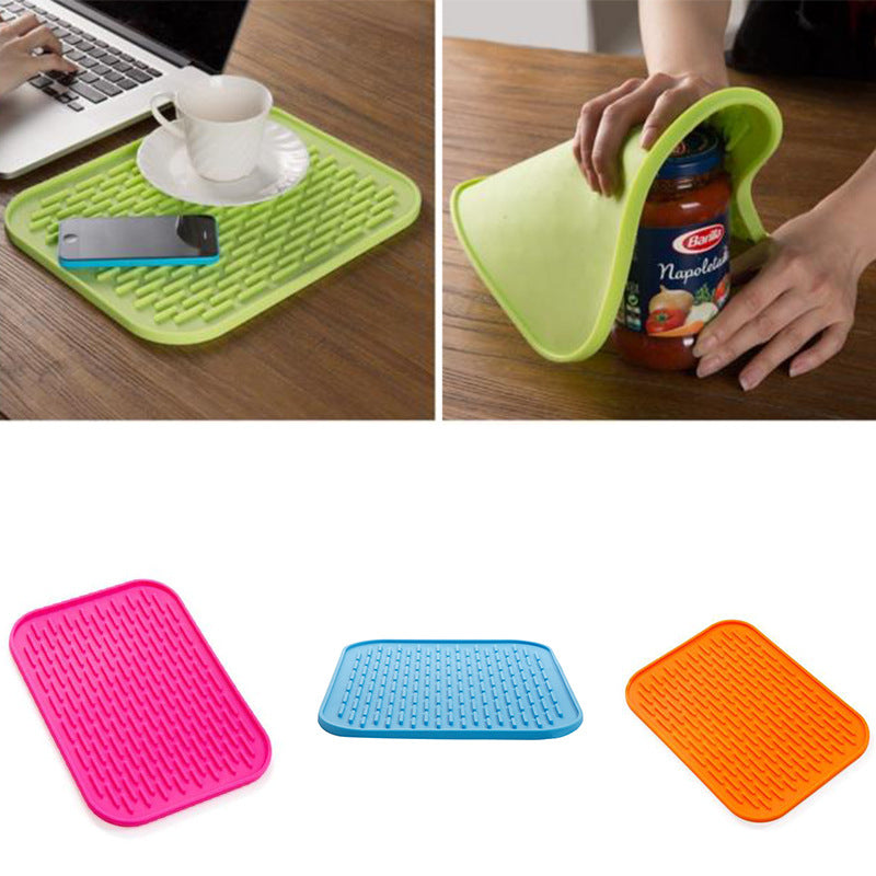 Versatile silicone heat-resistant mat for various uses.