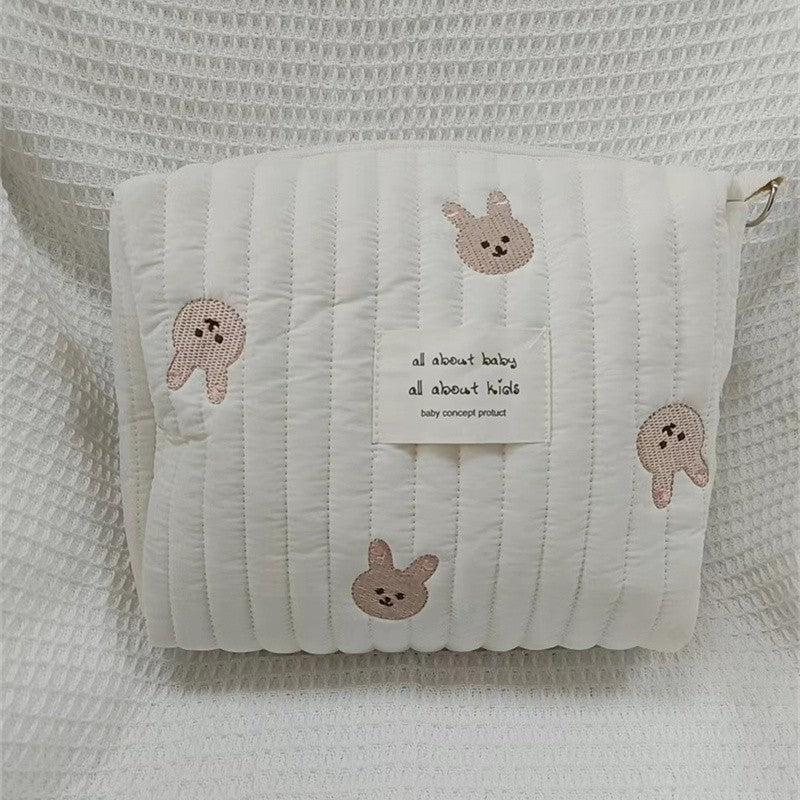 Embroidered Cotton Mommy Bag with Zipper Closure for Stroller Hanging, suitable for Diaper Bag use.