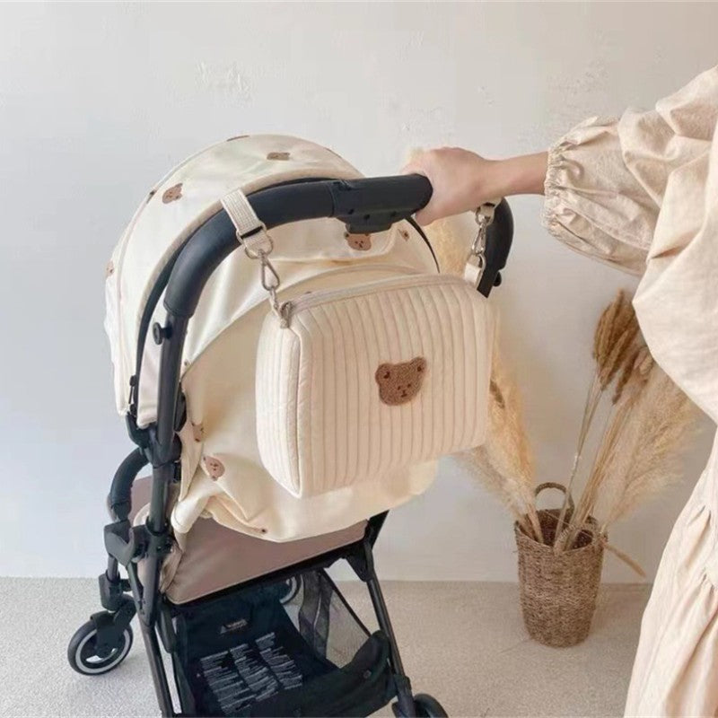 Embroidered Cotton Mommy Bag with Zipper Closure for Stroller Hanging, suitable for Diaper Bag use.